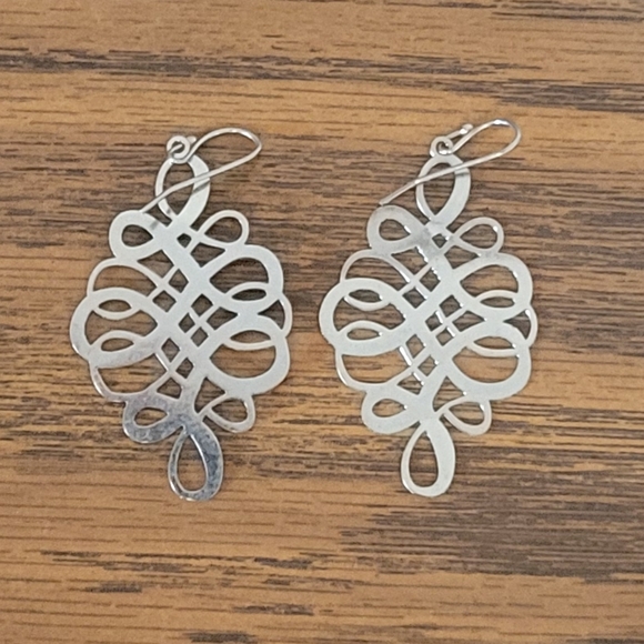 Silver bling swirl design drop earrings. - Picture 2 of 2